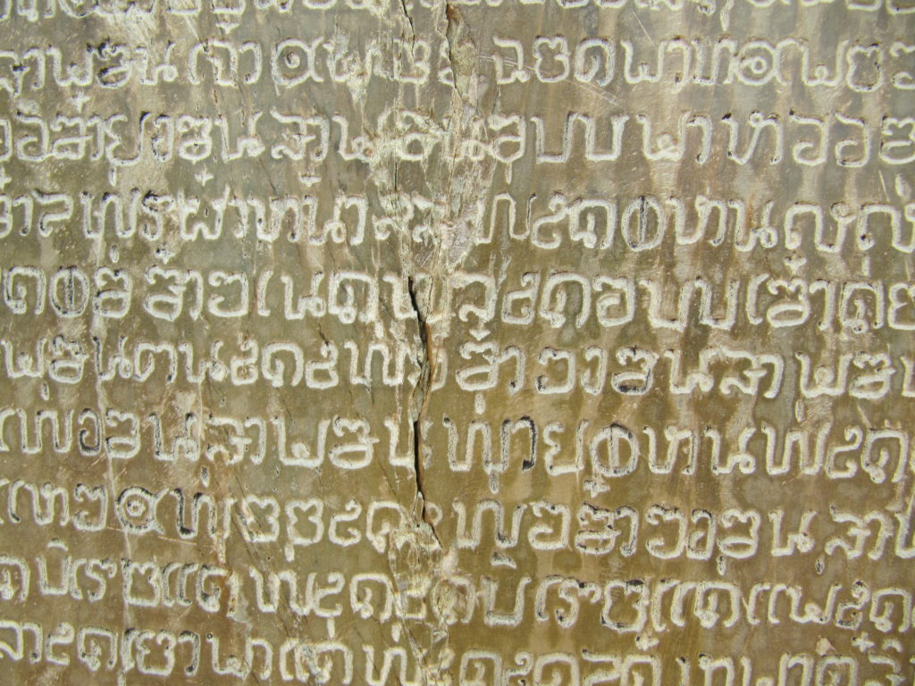 Thai writing engraved in stone