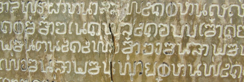 Thai writing engraved in stone