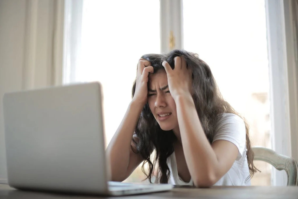 frustrated woman at computer